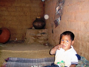 Little boy on his bed.