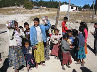 Happy children with their gifts.